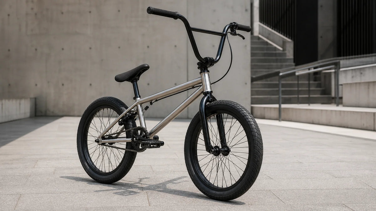 Premium freestyle BMX bicycle displayed alone in a modern urban plaza