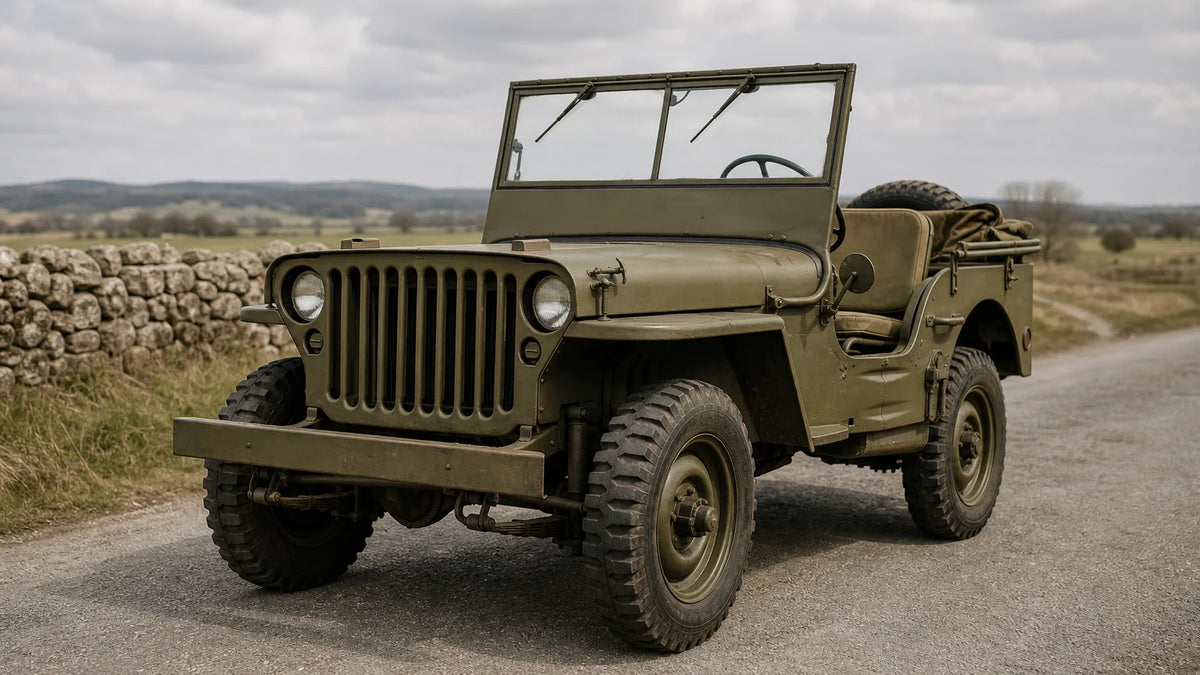 Olive drab Second World War-era military utility jeep on a rural road