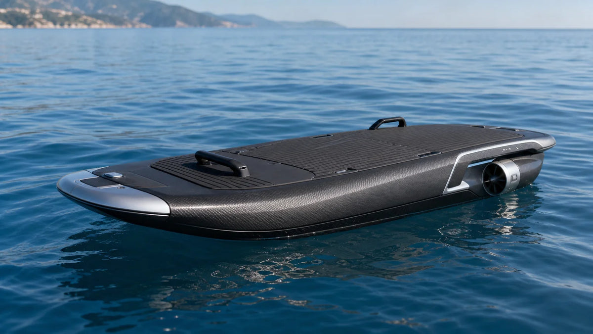 Modern electric jetboard floating on calm blue water.