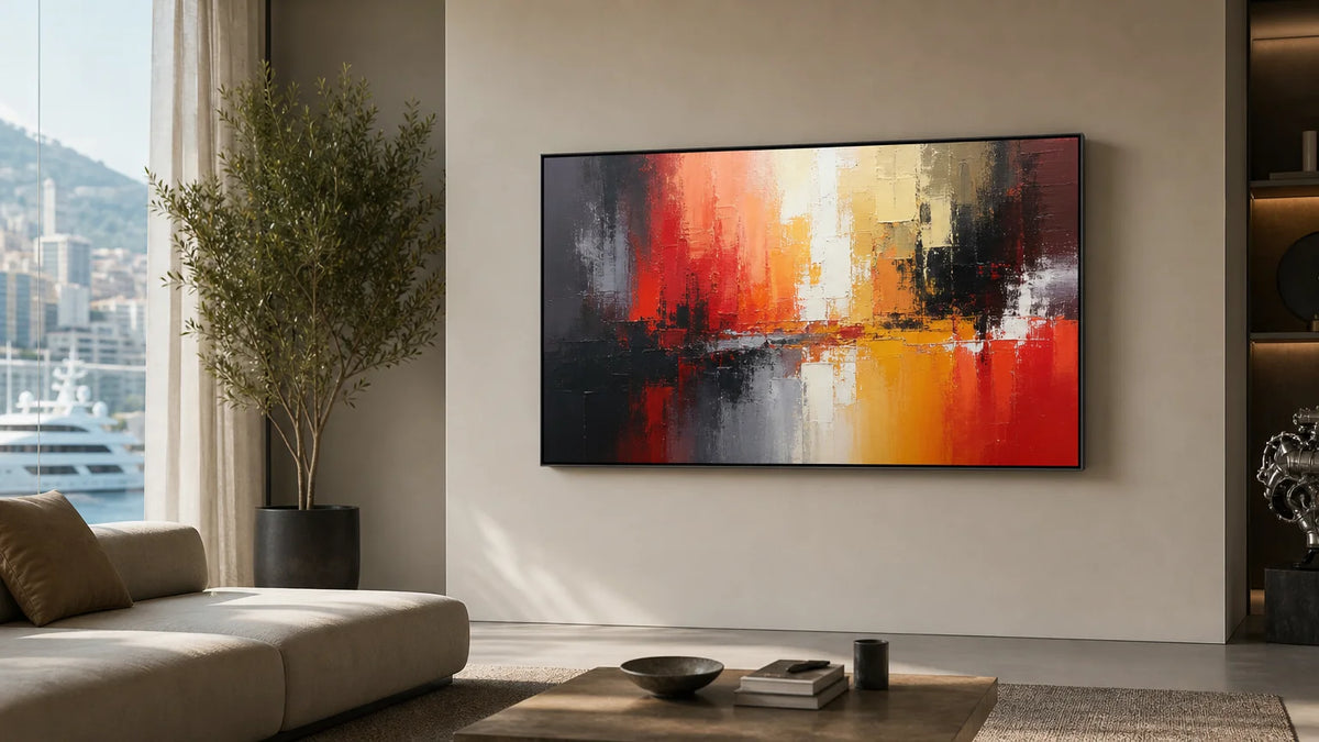 Wall-mounted digital art display showing an abstract painting in a modern living room