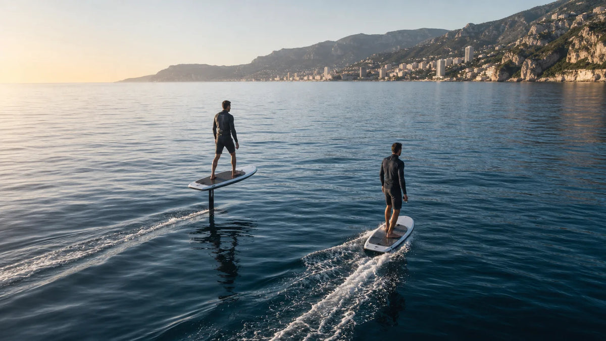 Two unbranded powered water boards showing hydrofoil flight and surface riding on calm open water.