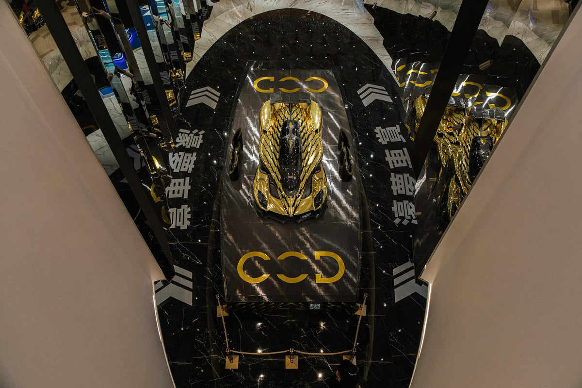 Bespoke gold-and-black RAESR Tachyon electric hypercar by TheArsenale at City of Dreams Macao