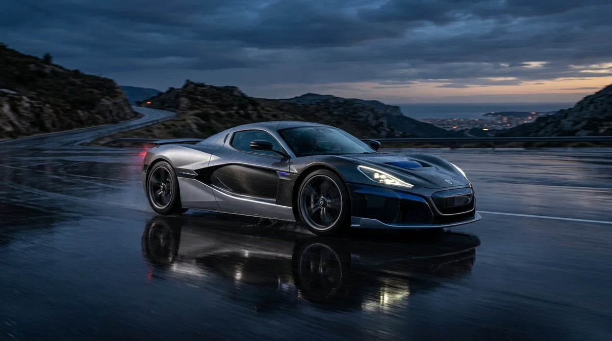 Sleek electric hypercar on a reflective surface at dusk