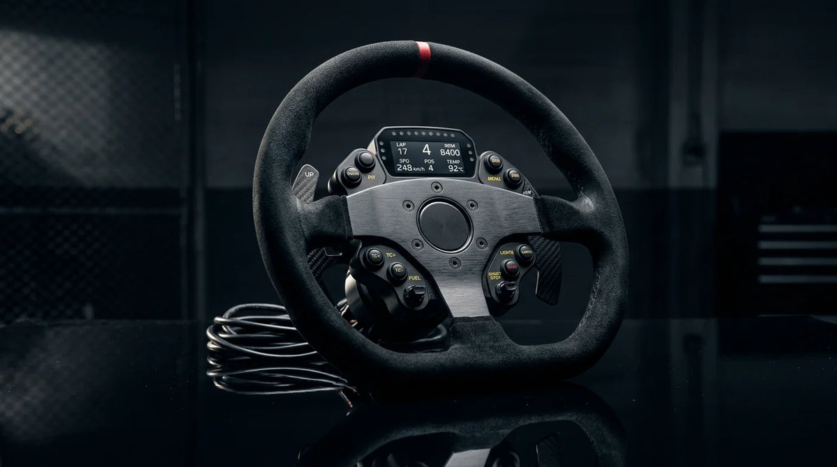 Premium racing steering wheel displayed under dramatic studio lighting