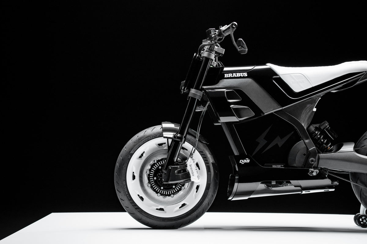 BRABUS URBAN E FRAGMENT EDITION motorcycle with black bodywork, white wheel and white leather seat