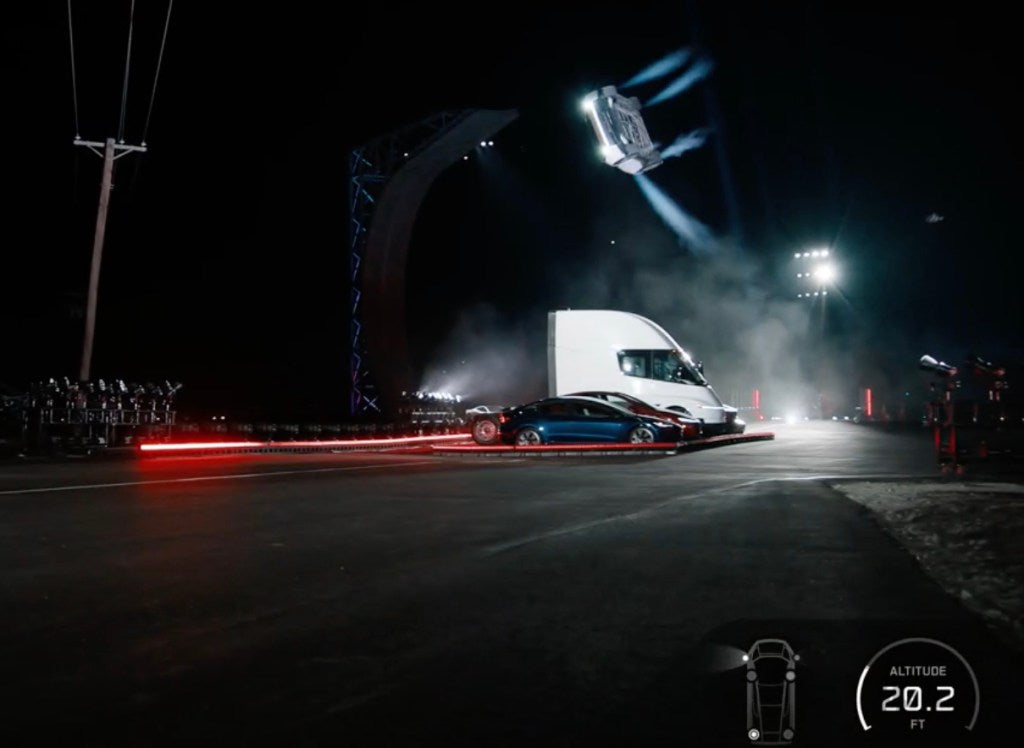 Tesla Roadster demonstrates a jump using thrusters during its October 2026 reveal. Image credit: Tesla via TechCrunch.